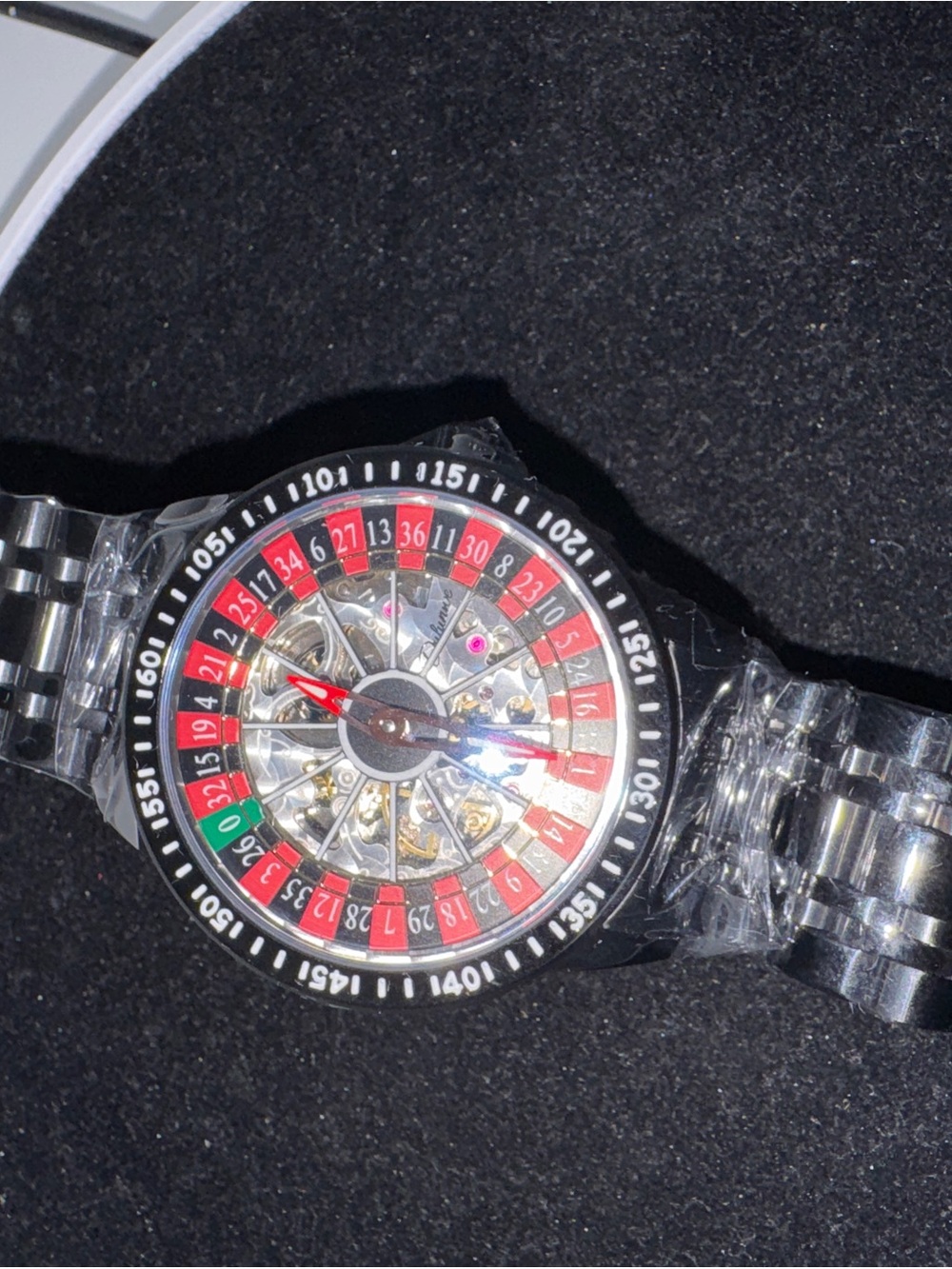 Men's Silver Roulette-Inspired Automatic Watch with Red and Black Dial